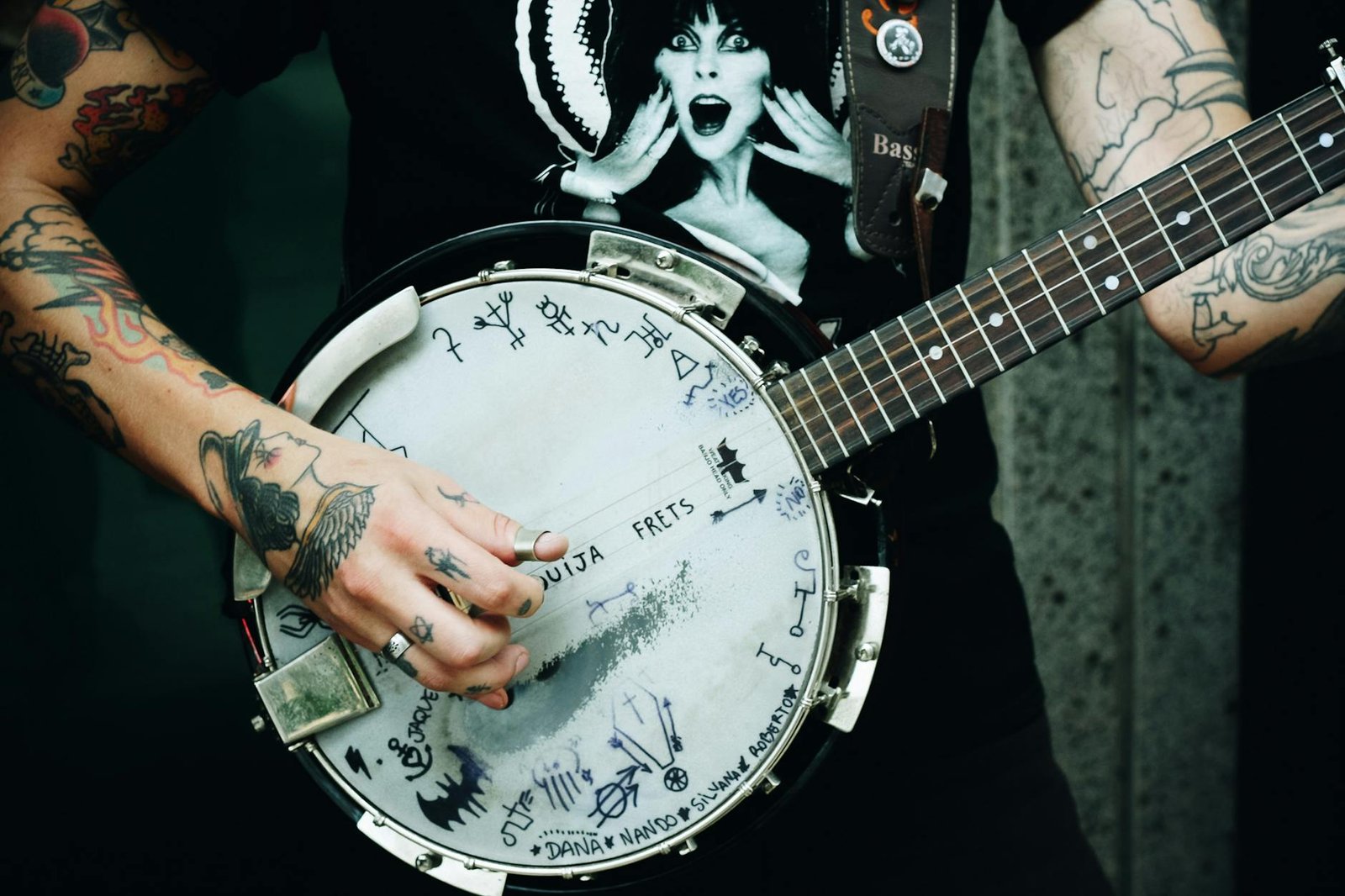 person holding banjo